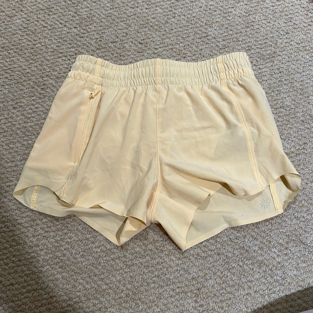 Athleta girl size 8-10 yellow athletic shorts